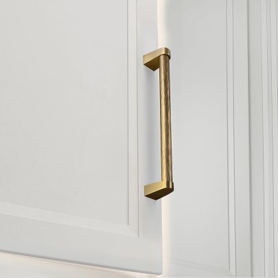 Image shown below is Leopard Appliance Pull in Aged Brass finish